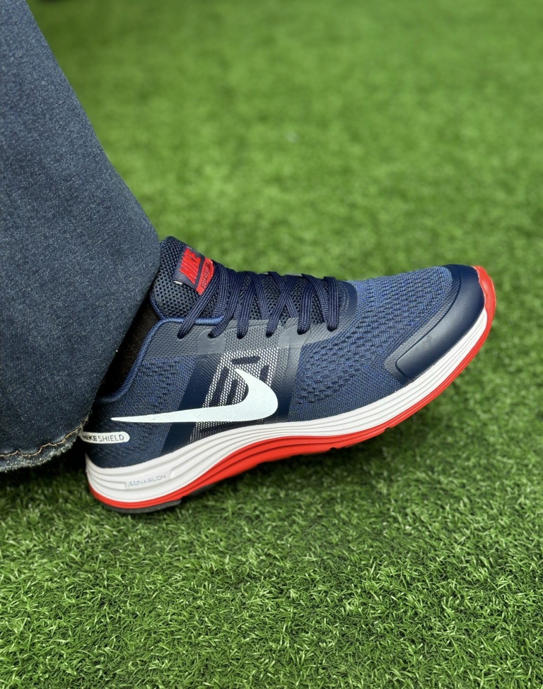 نایکی شیلد لونارلون سرمه ای قرمز نایکی شیلد لونارلون سرمه ای قرمز